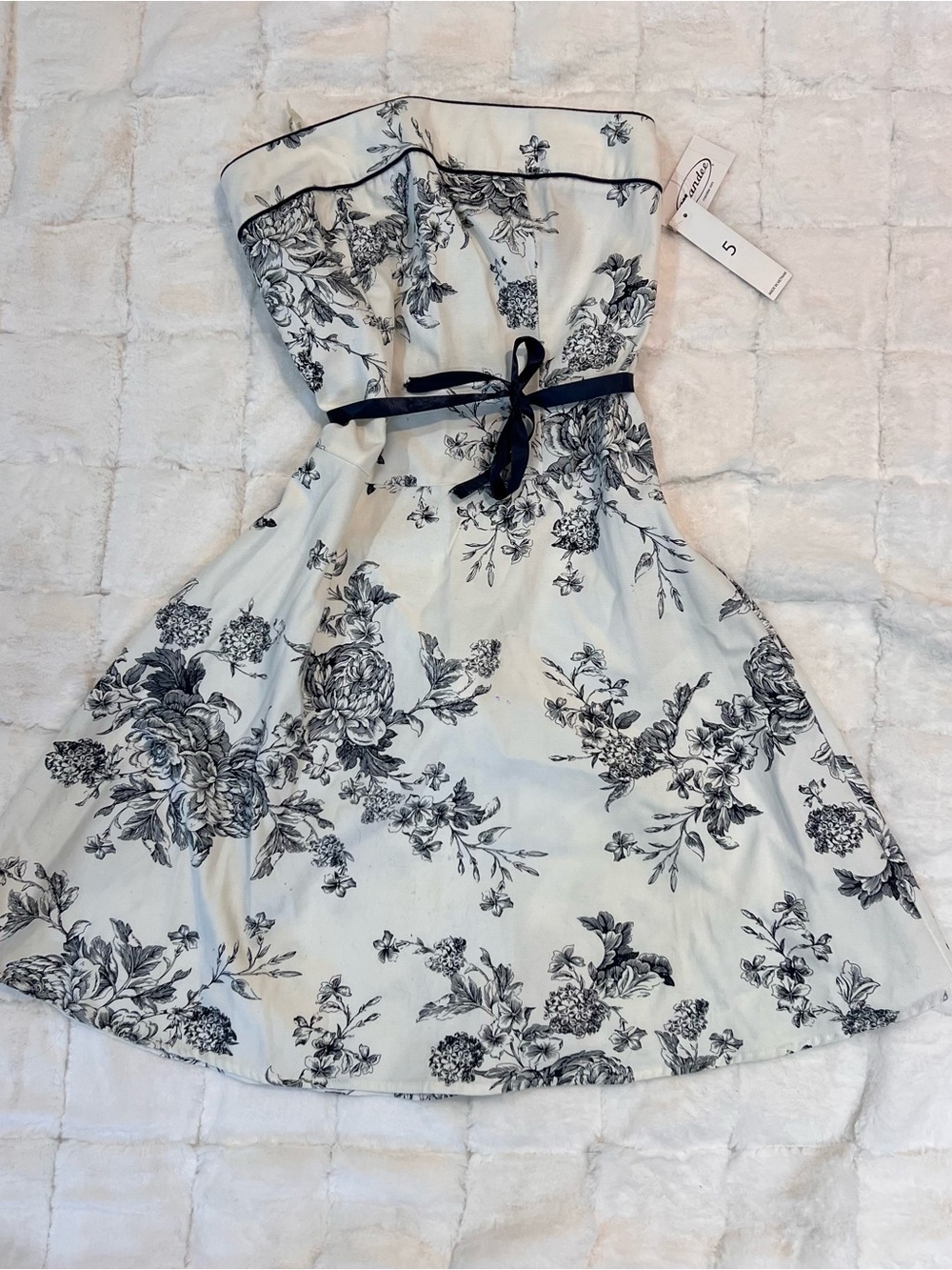 mandee Trendy White Dress with Navy Floral Print, Navy Trim, and Navy Ribbon